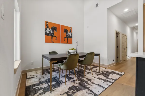a workspace with furniture and wooden floor