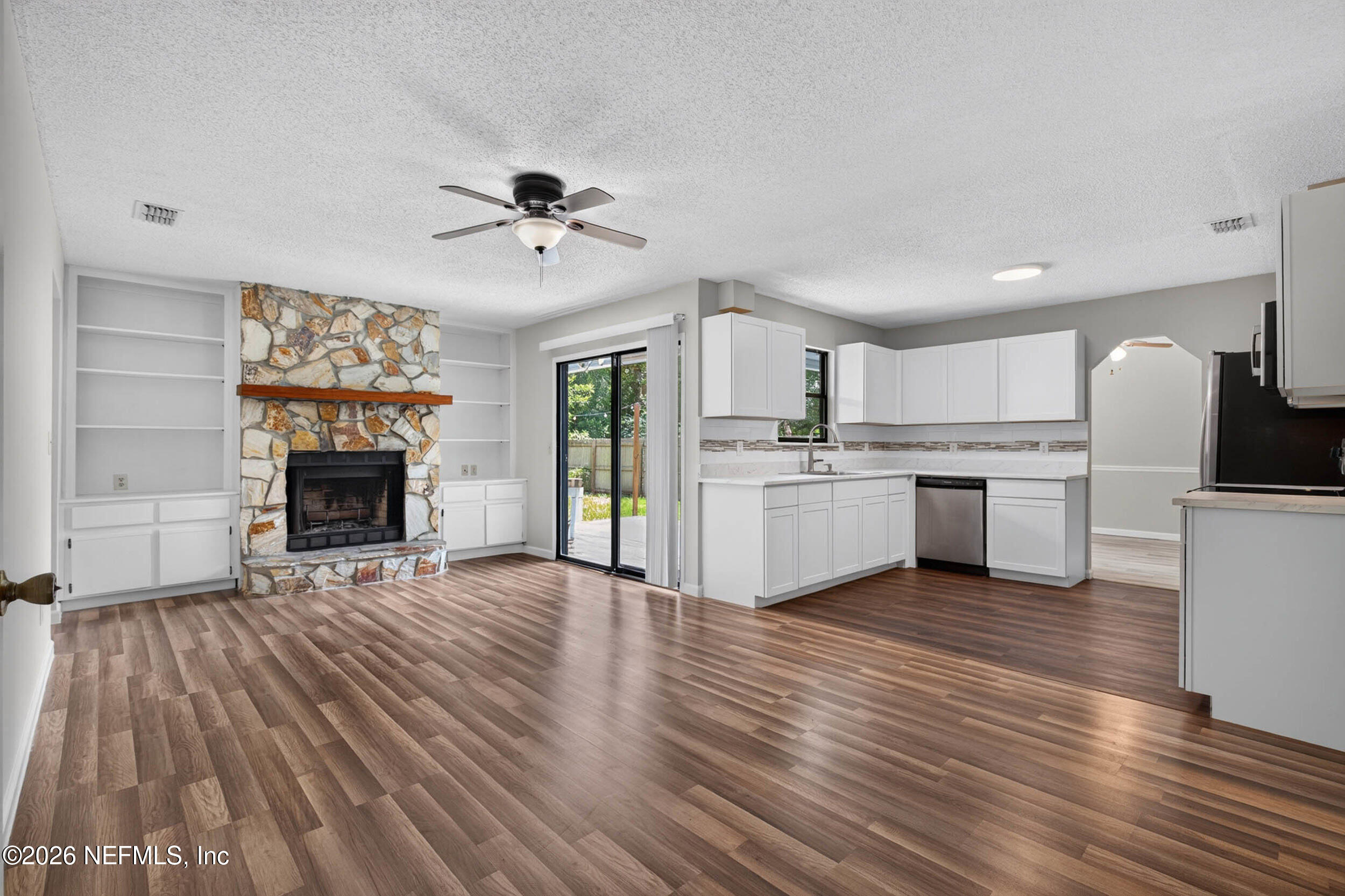 11561 St Josephs Road Jacksonville, FL 32223 - Photo 13 of 69 18_family & kitchen 2