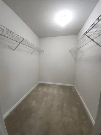 a view of a room with racks on the wall