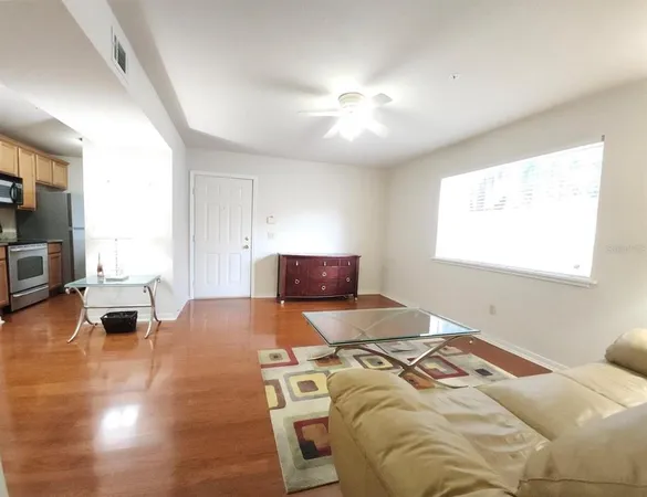 a bedroom with a bed and couch