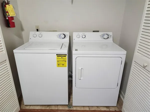 a utility room with dryer and washer