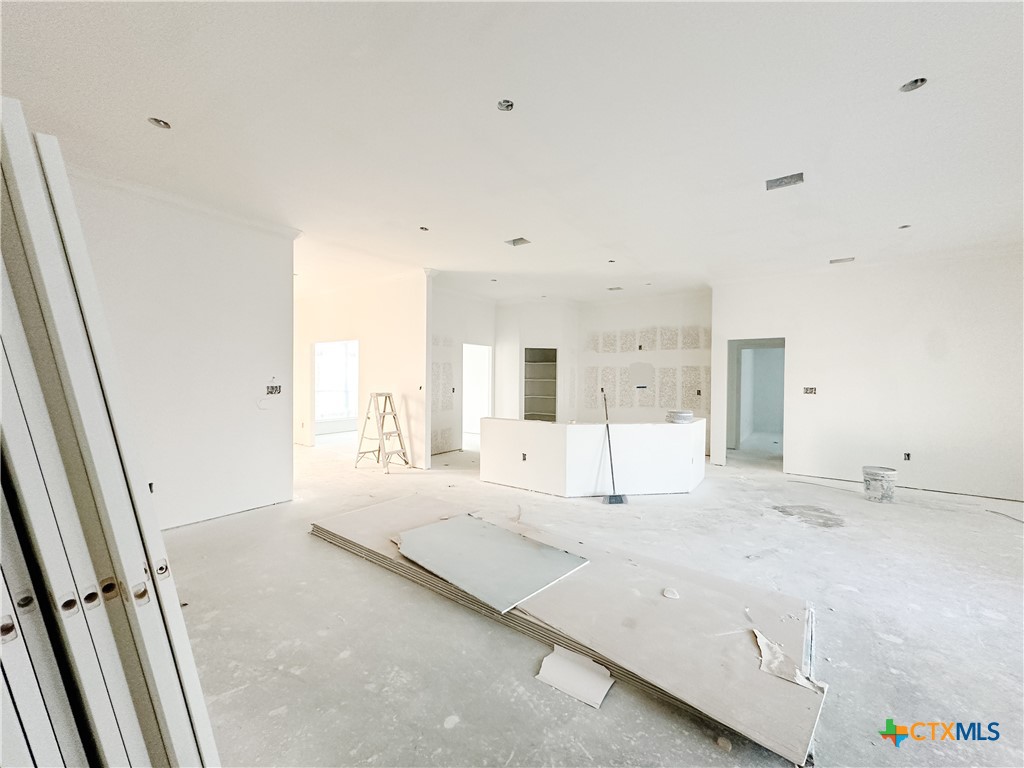 1400 Red Rock Road Hewitt, TX 76643 - Photo 4 of 7 a large white bedroom with a large bed