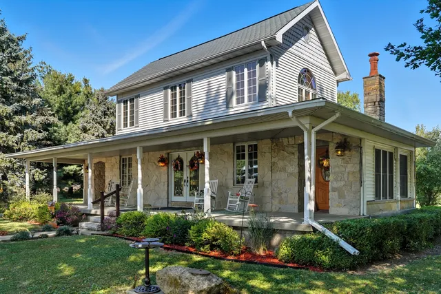 front view of a house with a yard