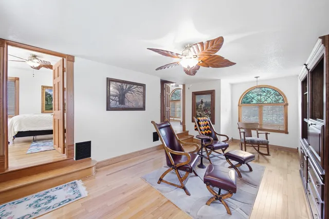 a bathroom with a sink a mirror and a shower