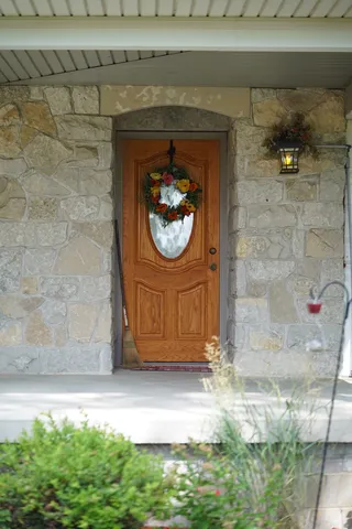 a view of a lake with a house in the background