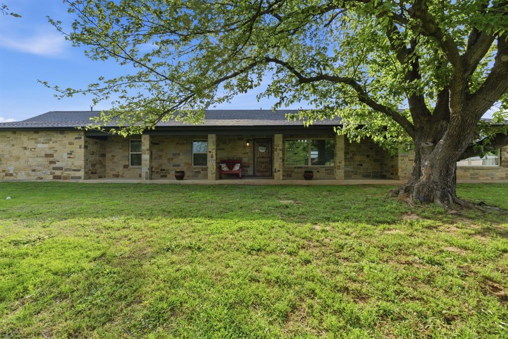 187 County Road 4195 Decatur, TX 76234 - Photo 36 of 40 a front view of a house with a yard