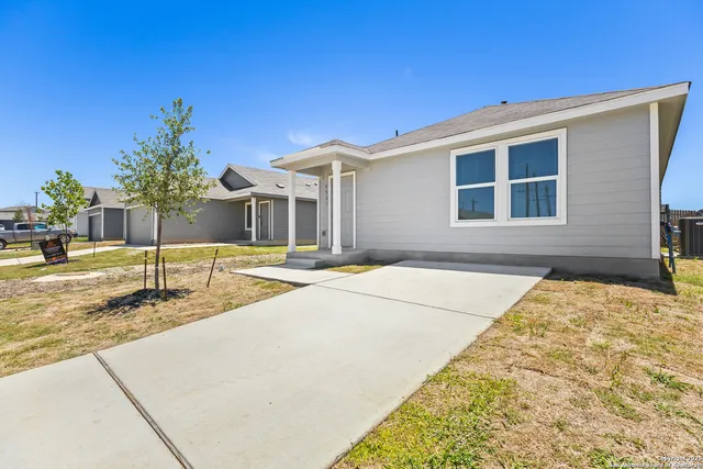 a swimming pool with yard