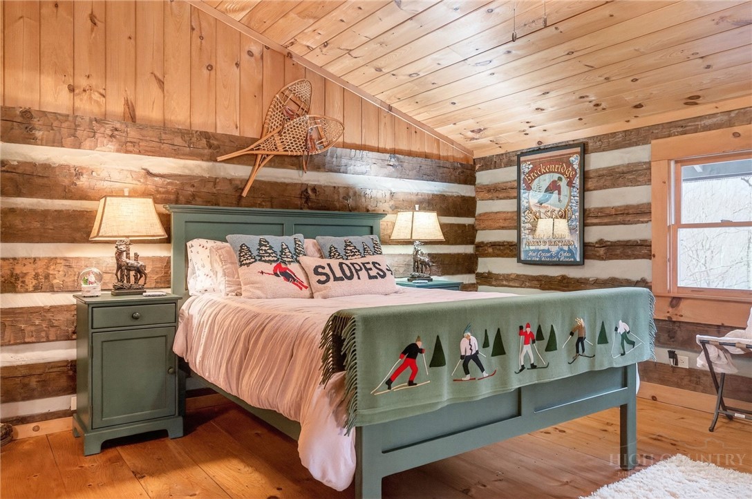 376 Yellow Bear Road Todd, NC 28684 - Photo 19 of 29 a bed room with a bed