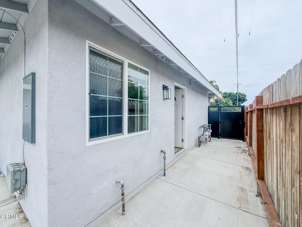 1301 Kingswood Way, Unit 2 Oxnard, CA 93030 - Photo 15 of 18 a view of a house with a backyard