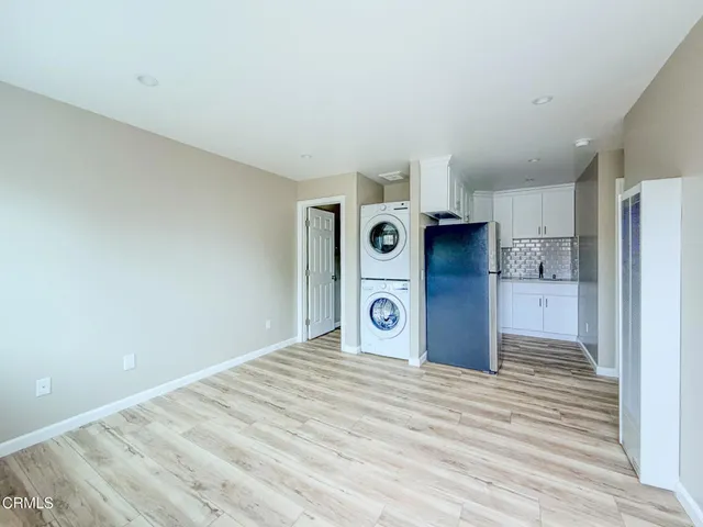 a view of a kitchen with a sink