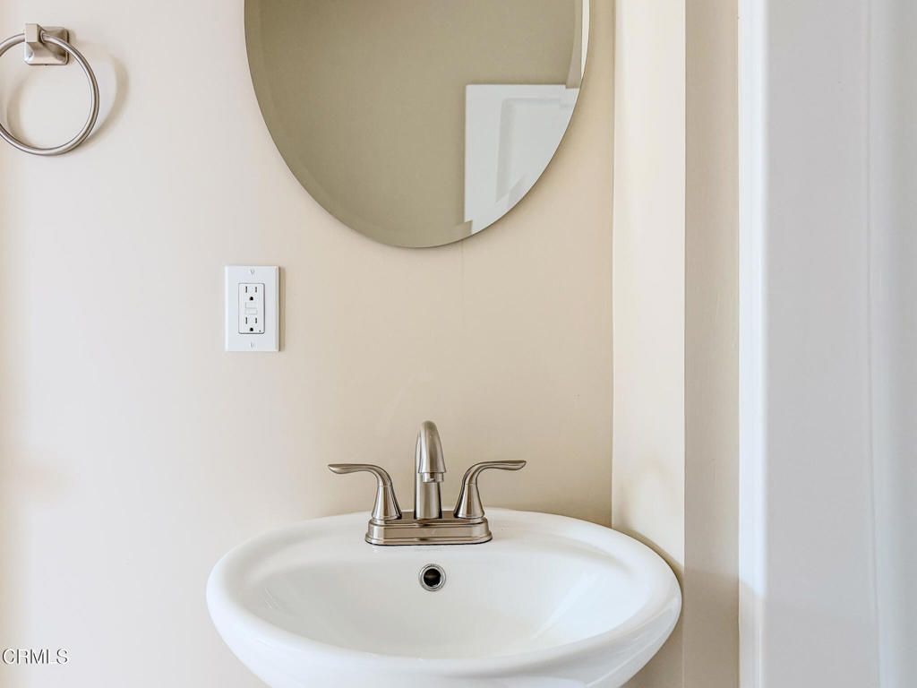 1301 Kingswood Way, Unit 2 Oxnard, CA 93030 - Photo 7 of 18 a bathroom with a sink and mirror