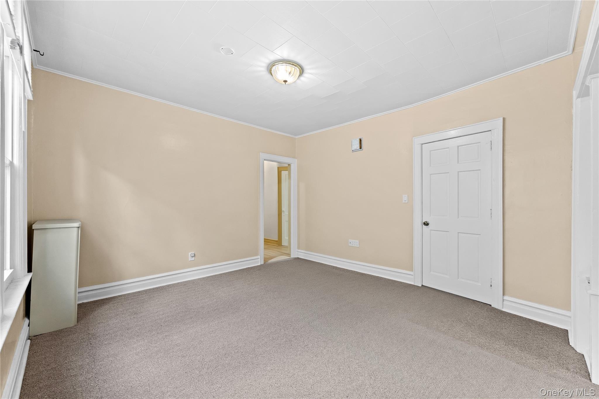 91-49 86th Street Queens, NY 11421 - Photo 16 of 42 a view of an empty room