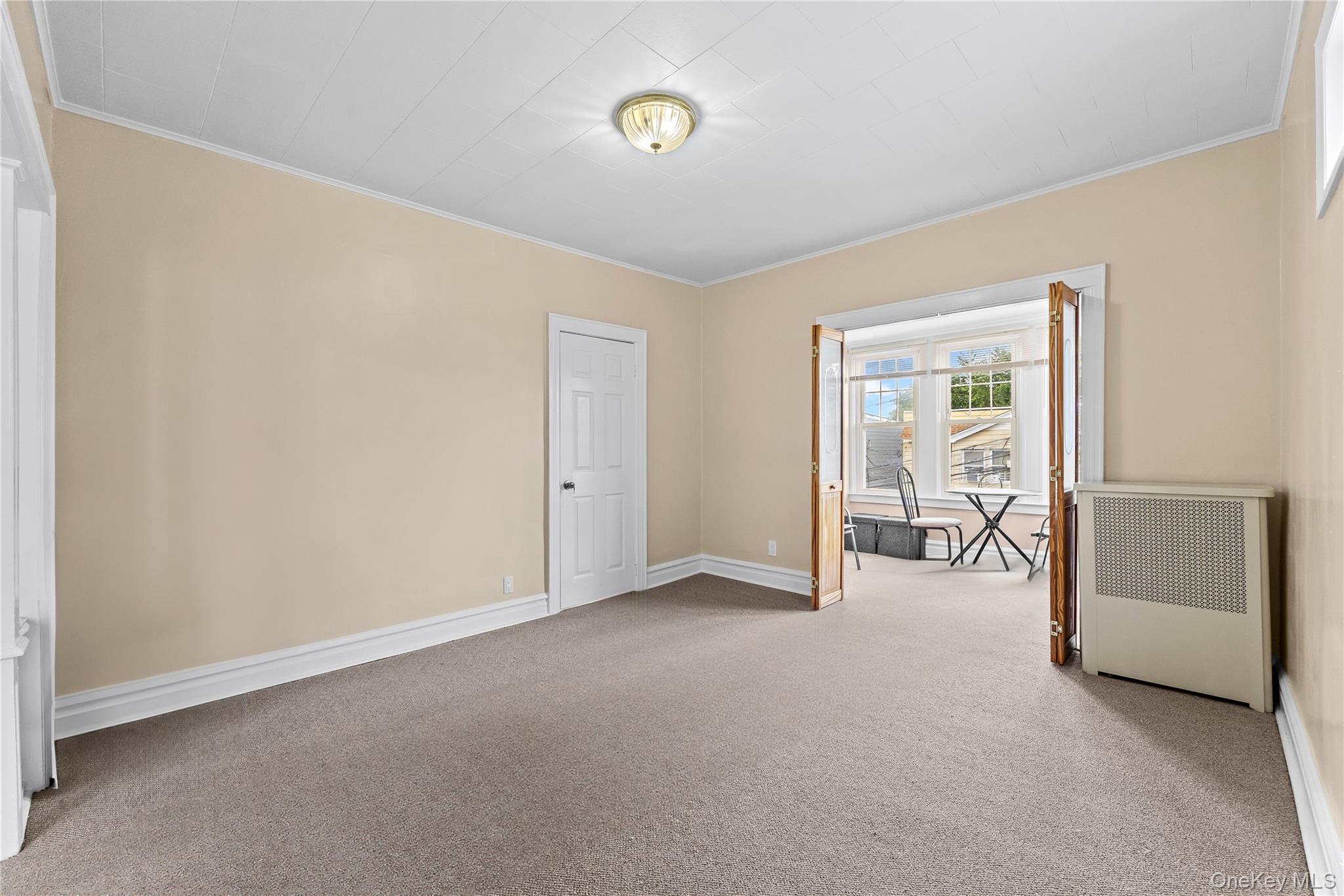 91-49 86th Street Queens, NY 11421 - Photo 17 of 42 a view of an empty room