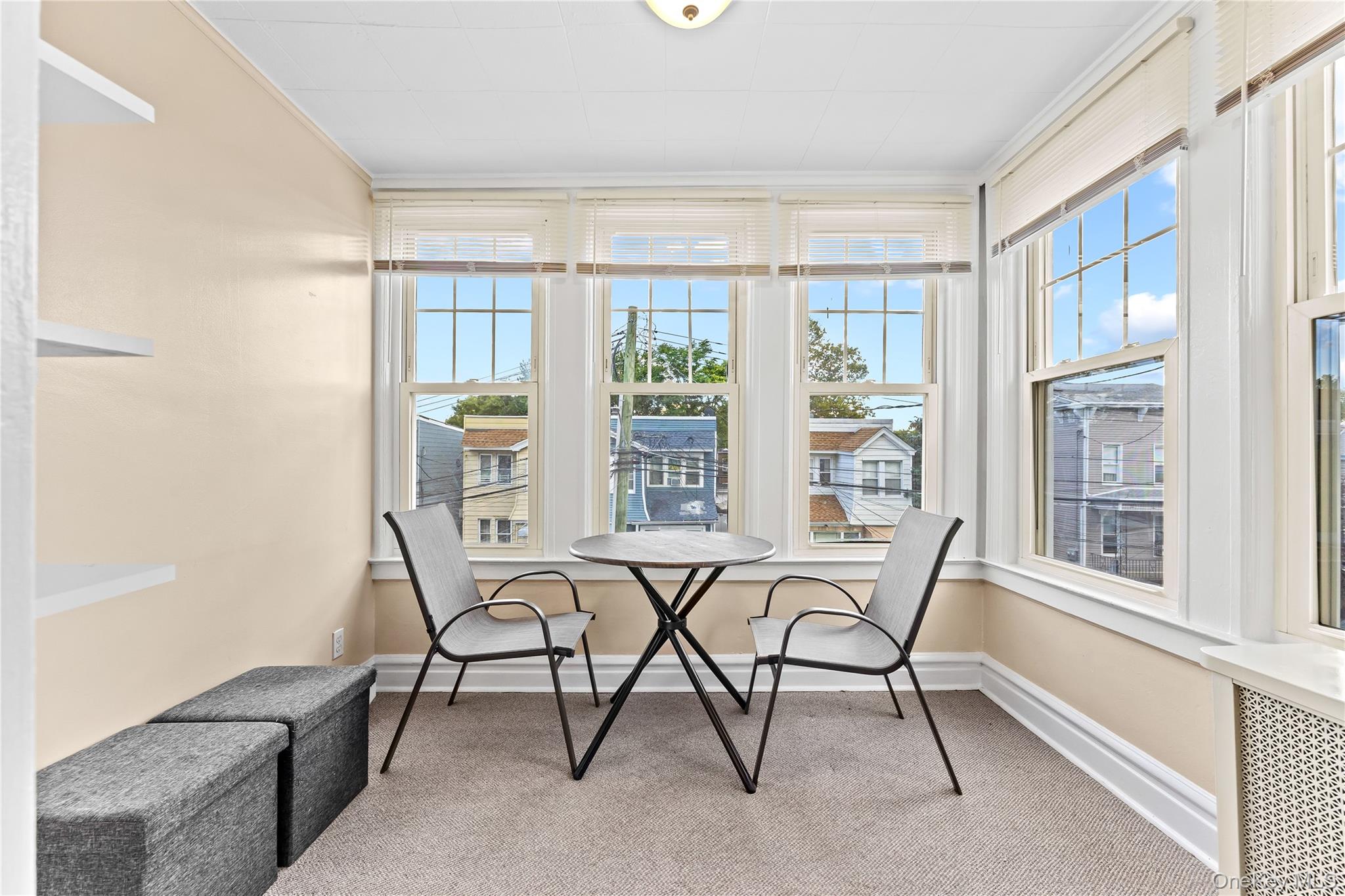 91-49 86th Street Queens, NY 11421 - Photo 19 of 42 a view of a livingroom with furniture and a window