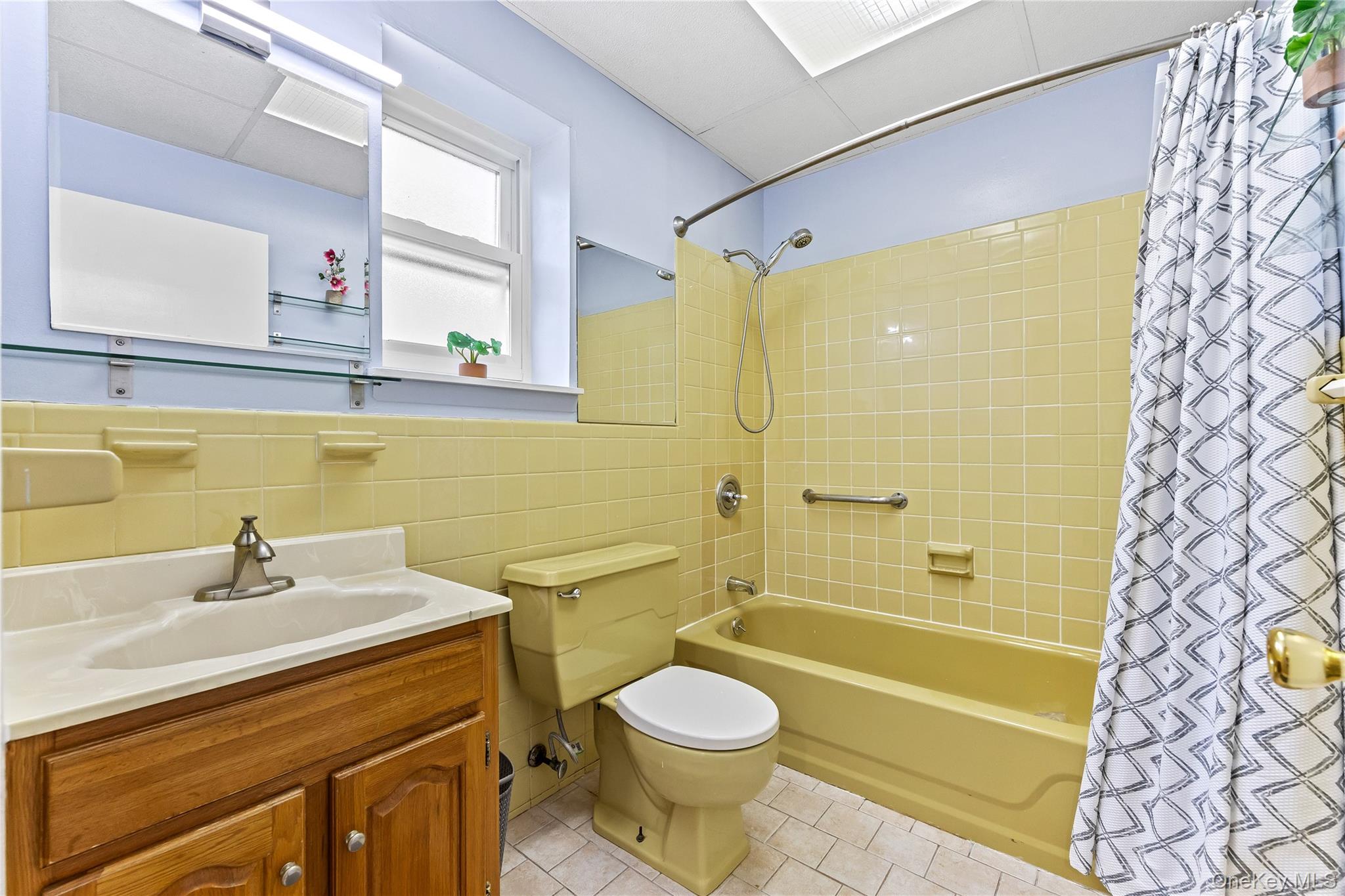 91-49 86th Street Queens, NY 11421 - Photo 25 of 42 a bathroom with a sink toilet and shower