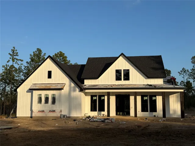 a view of house and yard