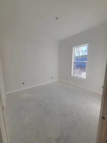 a view of an empty walk in closet