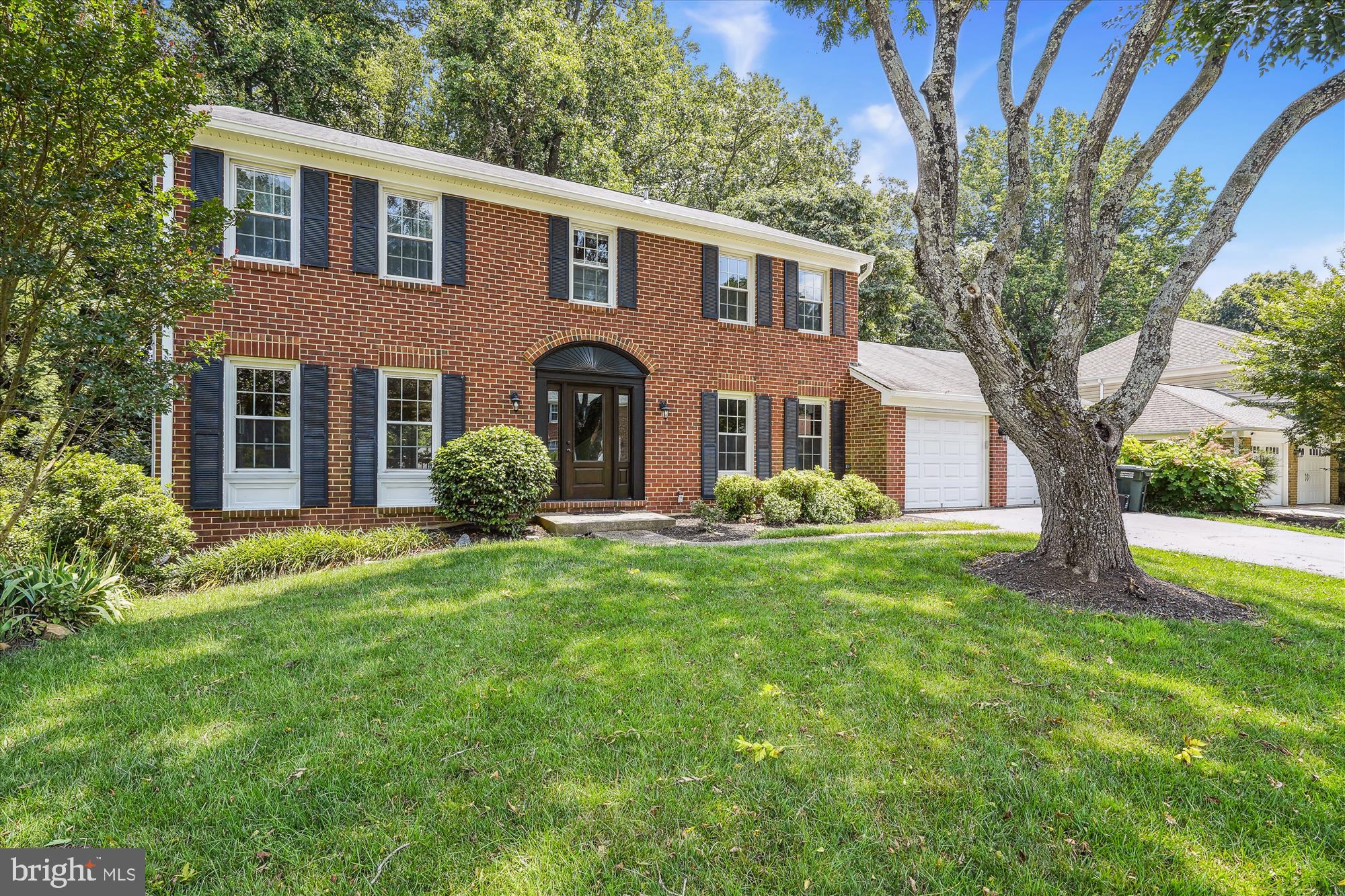 2613 Mountain Laurel Place Reston, VA 20191 - Photo 1 of 78 a front view of a house with garden