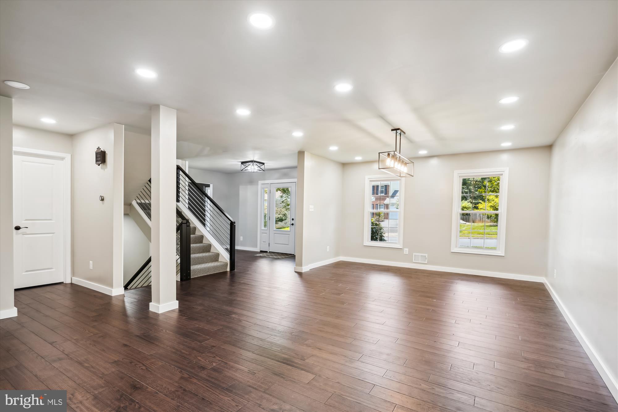 2613 Mountain Laurel Place Reston, VA 20191 - Photo 15 of 78 a view of an empty room with wooden floor and a window