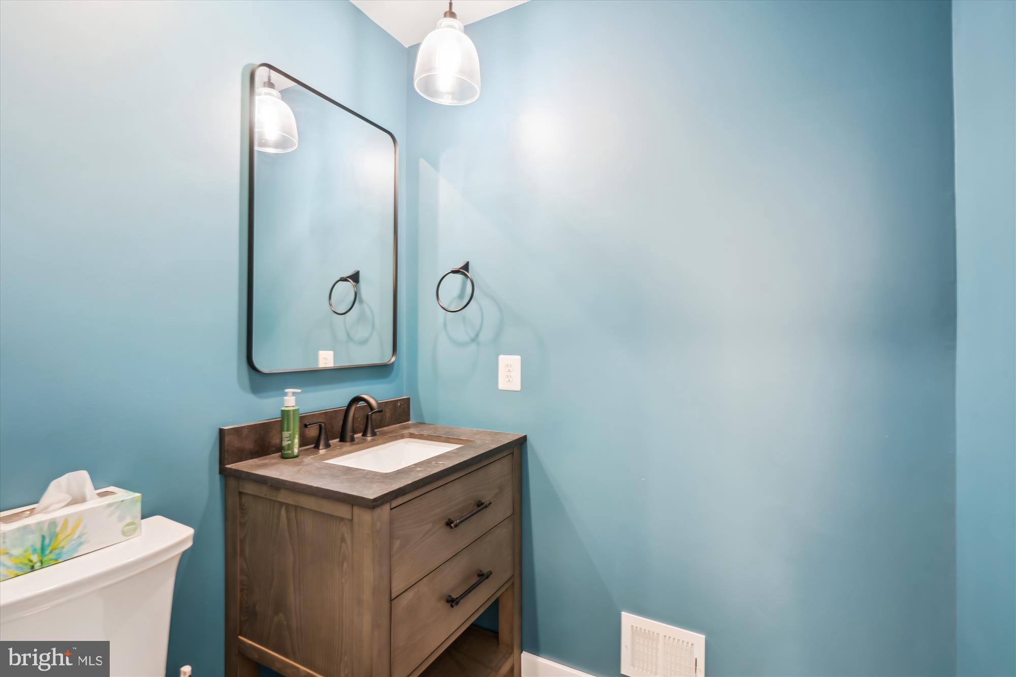2613 Mountain Laurel Place Reston, VA 20191 - Photo 17 of 78 a bathroom with a sink vanity and mirror