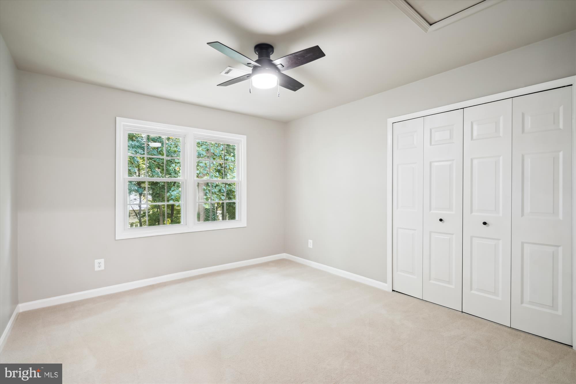 2613 Mountain Laurel Place Reston, VA 20191 - Photo 27 of 78 an empty room with windows and fan
