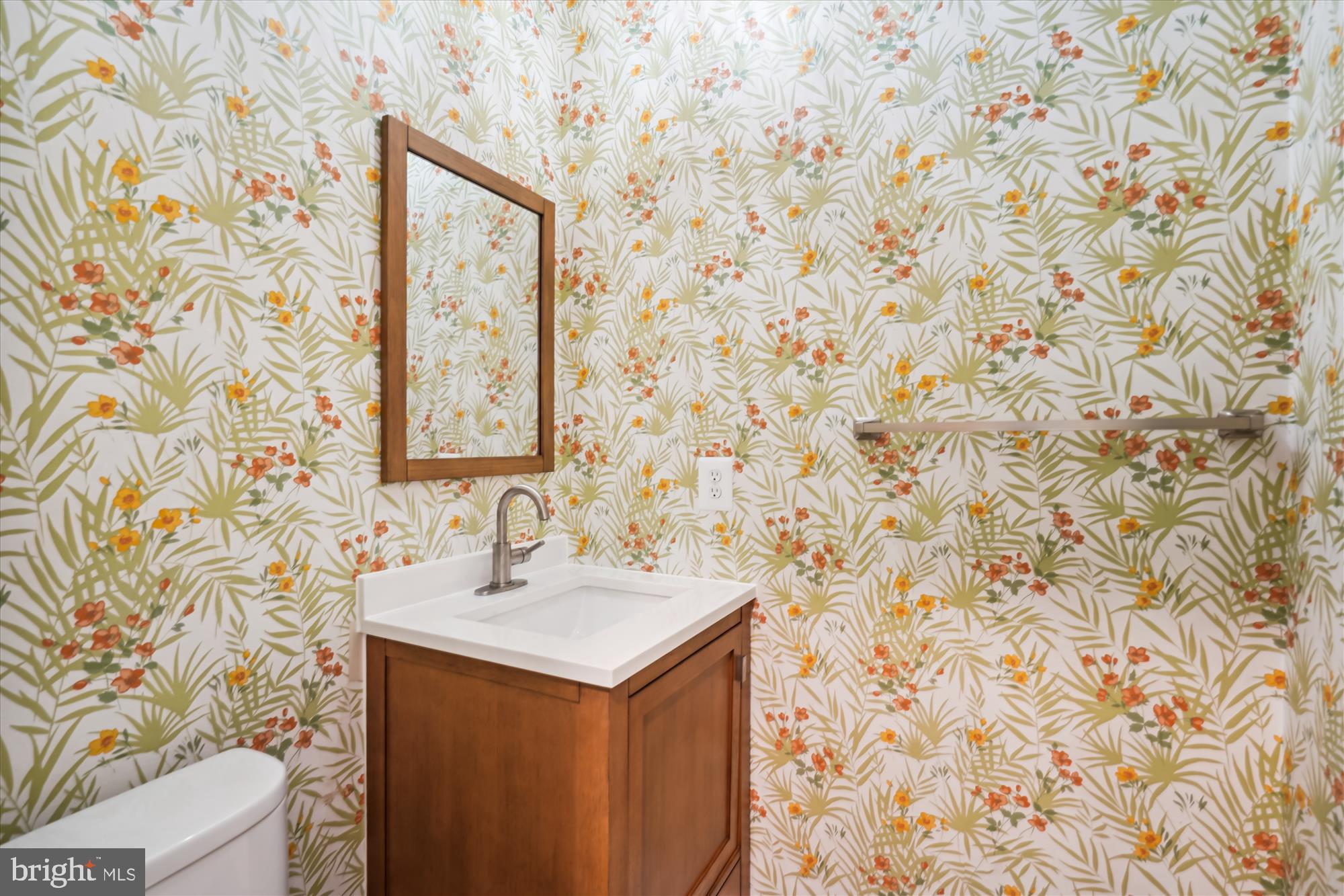 2613 Mountain Laurel Place Reston, VA 20191 - Photo 37 of 78 a bathroom with a sink toilet and mirror