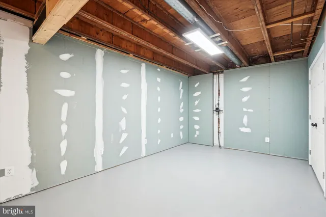 a front view of multi story residential apartment building with yard