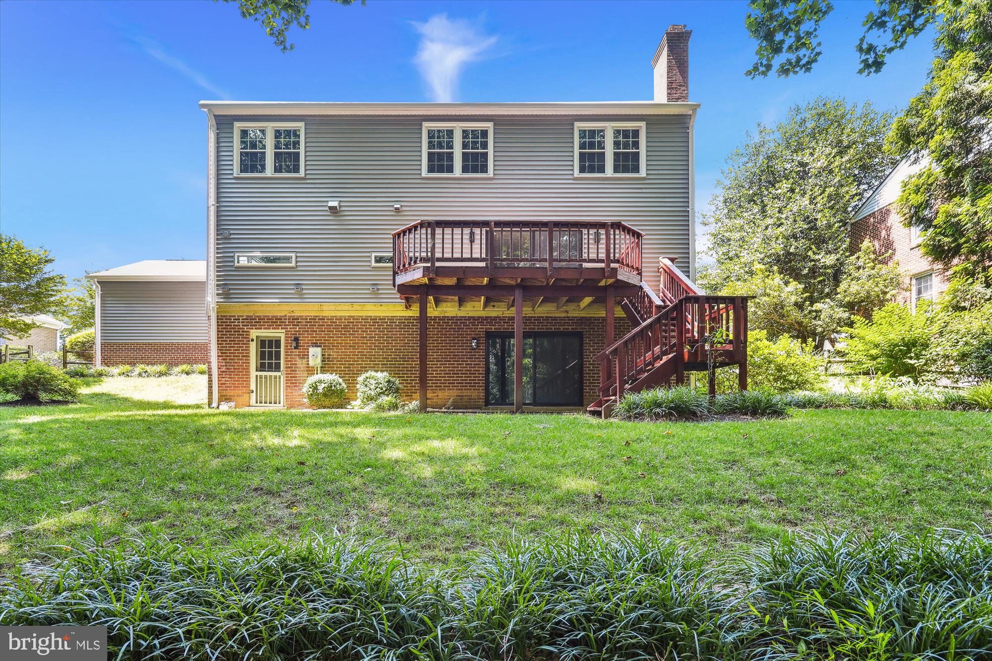 2613 Mountain Laurel Place Reston, VA 20191 - Photo 39 of 78 a view of a house with a yard and sitting area