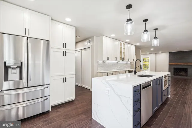 a view of a livingroom with wooden floor