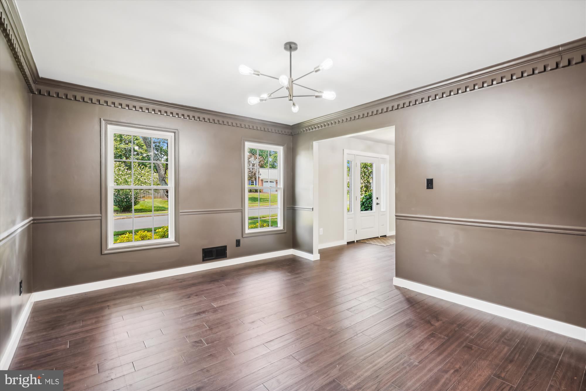 2613 Mountain Laurel Place Reston, VA 20191 - Photo 10 of 78 a view of an empty room with window and wooden floor