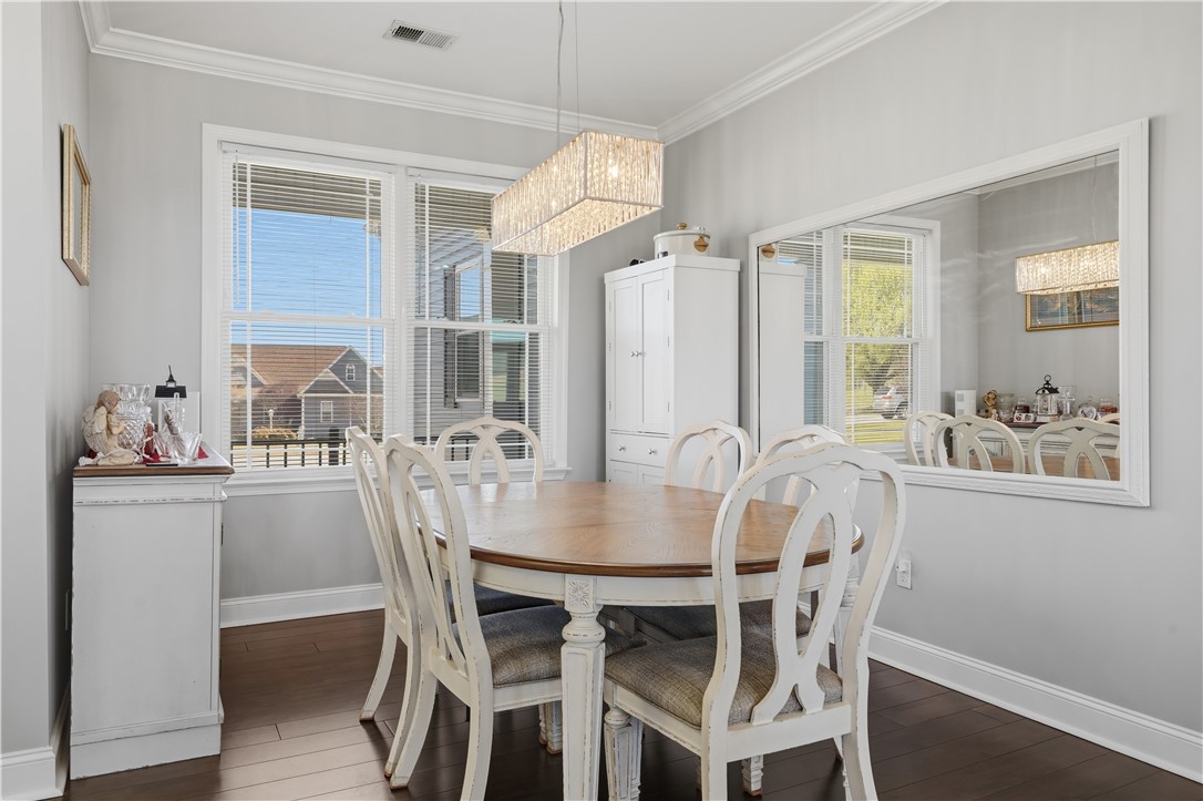 1312 Falcons Drive Walhalla, SC 29691 - Photo 11 of 34 This dining area features abundant natural light and elegant hardwood flooring.