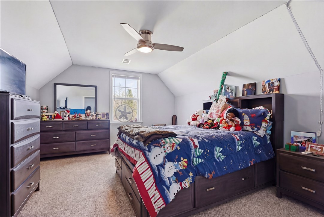 1312 Falcons Drive Walhalla, SC 29691 - Photo 17 of 34 This spacious bedroom offers ample natural light and comfortable living.