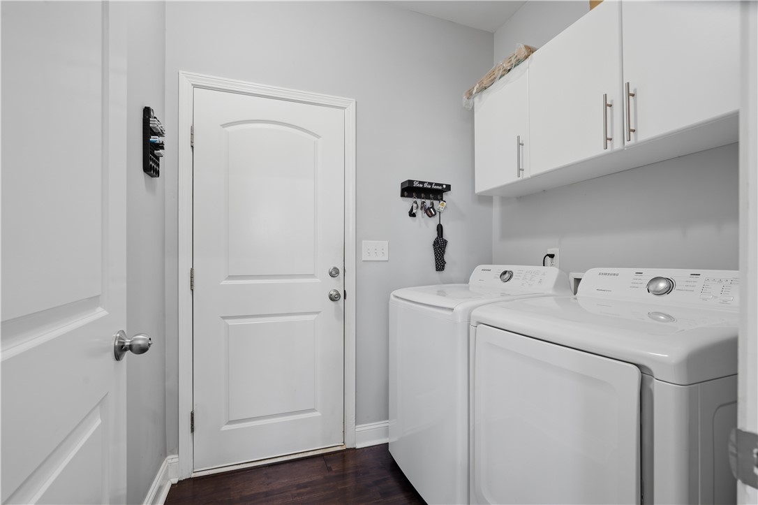 1312 Falcons Drive Walhalla, SC 29691 - Photo 22 of 34 This dedicated laundry room includes modern appliances and convenient storage solutions.