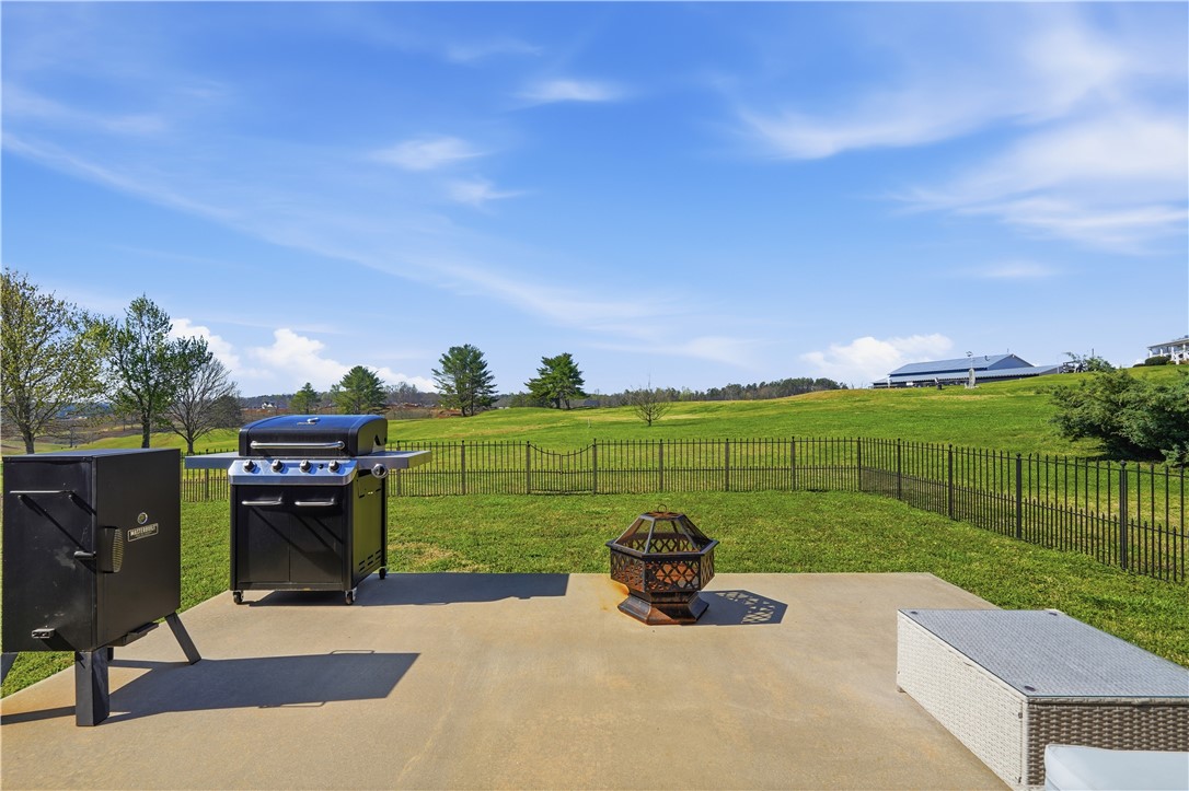 1312 Falcons Drive Walhalla, SC 29691 - Photo 23 of 34 This spacious patio area offers a perfect setting for outdoor entertaining and relaxation.
