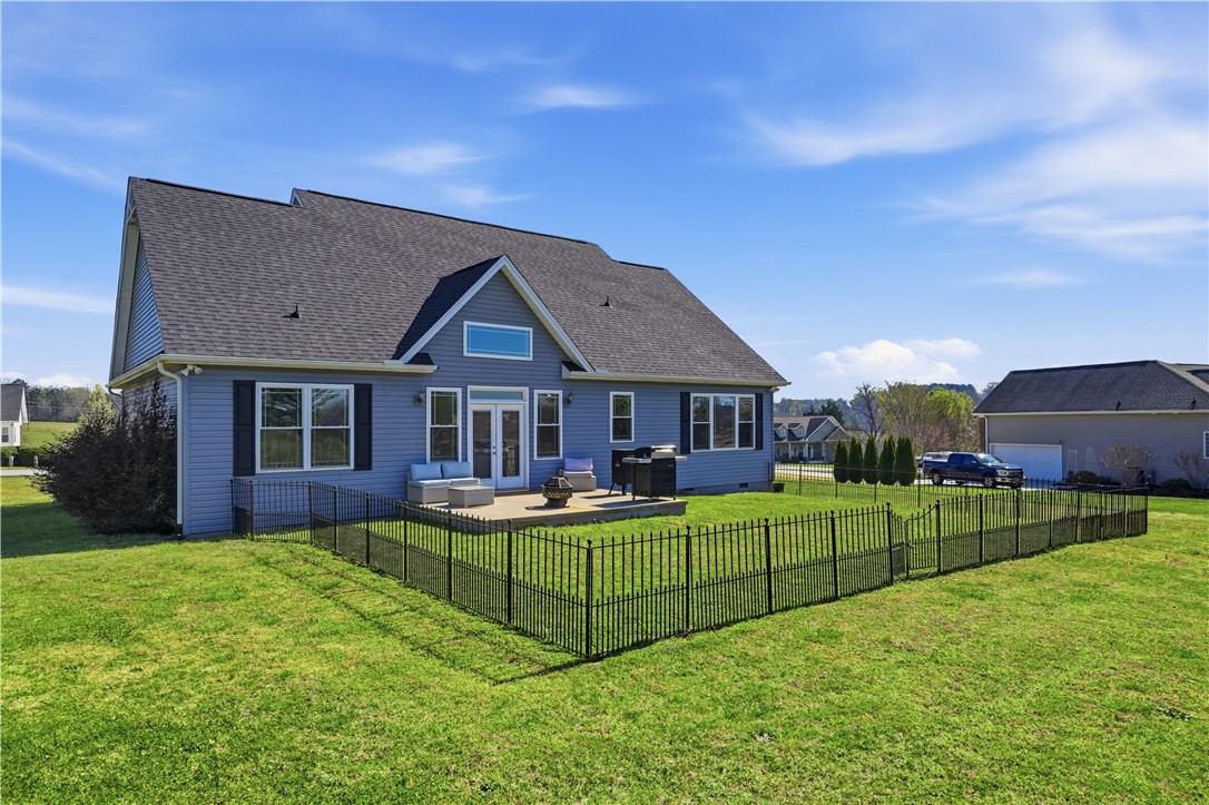 1312 Falcons Drive Walhalla, SC 29691 - Photo 25 of 34 This residence features a patio for outdoor living and a fenced yard, perfect for enjoyment.