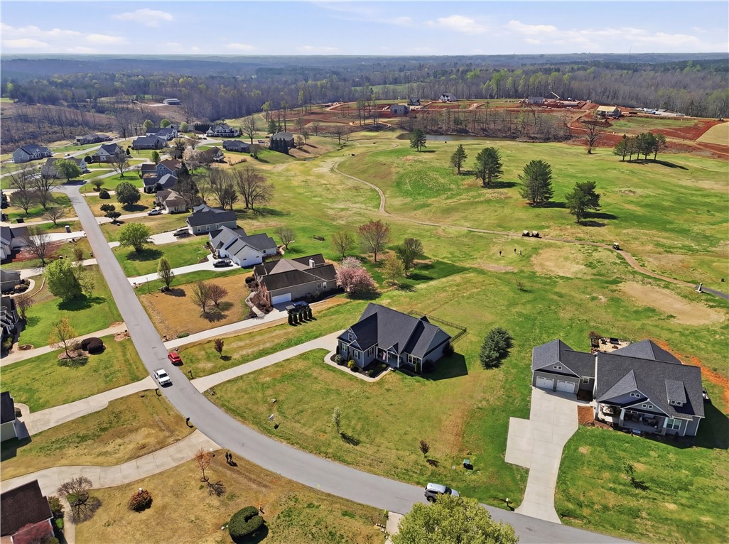 1312 Falcons Drive Walhalla, SC 29691 - Photo 29 of 34 An aerial perspective reveals a residential community nestled beside a sprawling golf course.