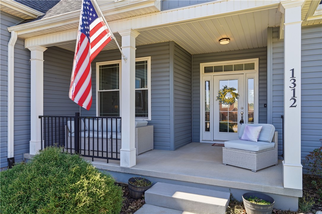 1312 Falcons Drive Walhalla, SC 29691 - Photo 4 of 34 This charming residence features a welcoming front porch, ideal for relaxation and outdoor enjoyment.