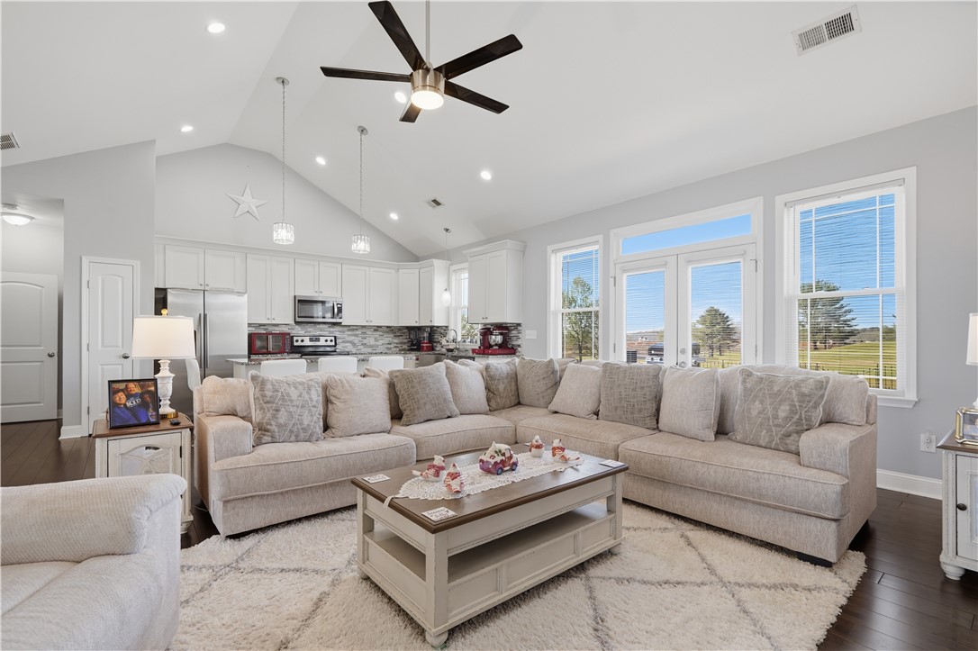 1312 Falcons Drive Walhalla, SC 29691 - Photo 5 of 34 This bright and open-concept living area features a kitchen and seamless access to the outdoors.