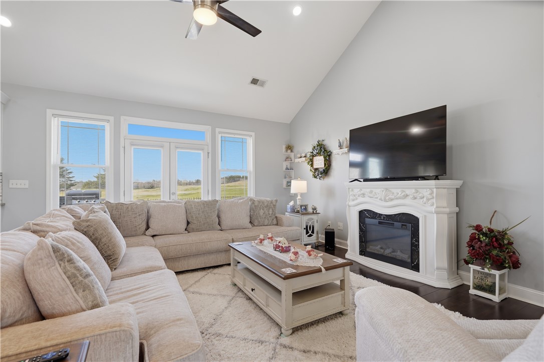1312 Falcons Drive Walhalla, SC 29691 - Photo 6 of 34 This bright living space features abundant natural light and an elegant fireplace.