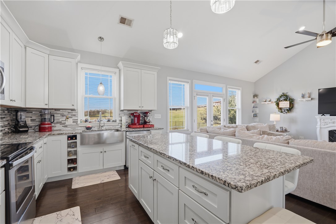 1312 Falcons Drive Walhalla, SC 29691 - Photo 10 of 34 This bright kitchen features sleek appliances, ample counter space, and an open layout to the living area.