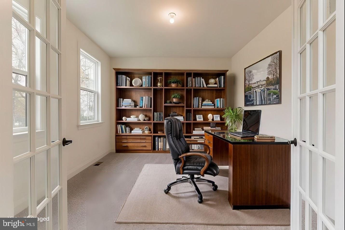 3 Martha Way Warwick, MD 21912 - Photo 4 of 8 a view of a workspace with furniture and a window