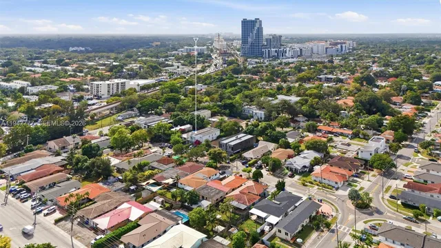 an aerial view of a city with lots of residential buildings