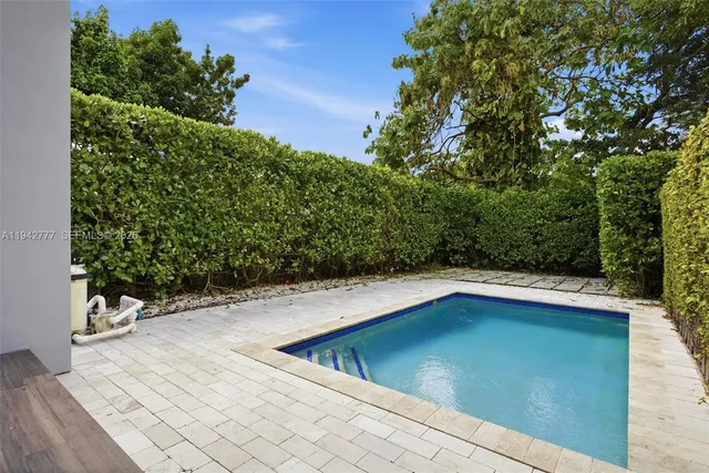 a view of outdoor space pool and lake view