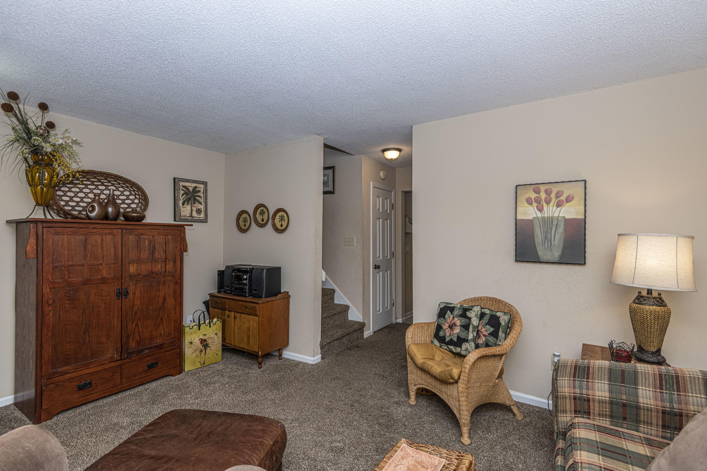 1426 Camp Road, Unit A Charleston, SC 29412 - Photo 6 of 23 Living Room to Stairs & Kitchen