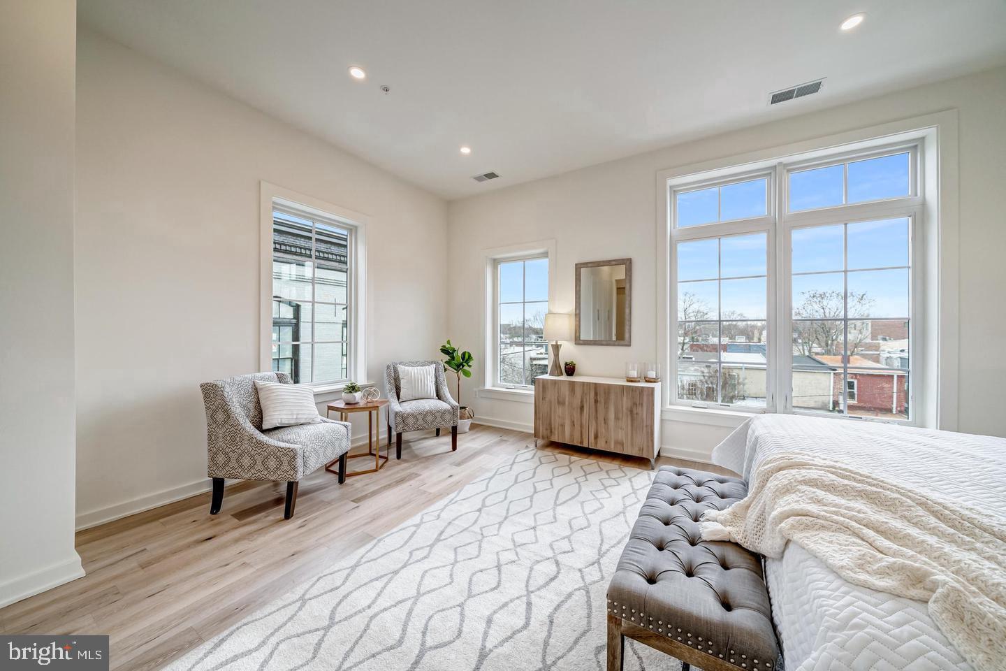 442.5 R Street Northwest, Unit B Washington, DC 20009 - Photo 14 of 25 a bedroom with furniture and a large window