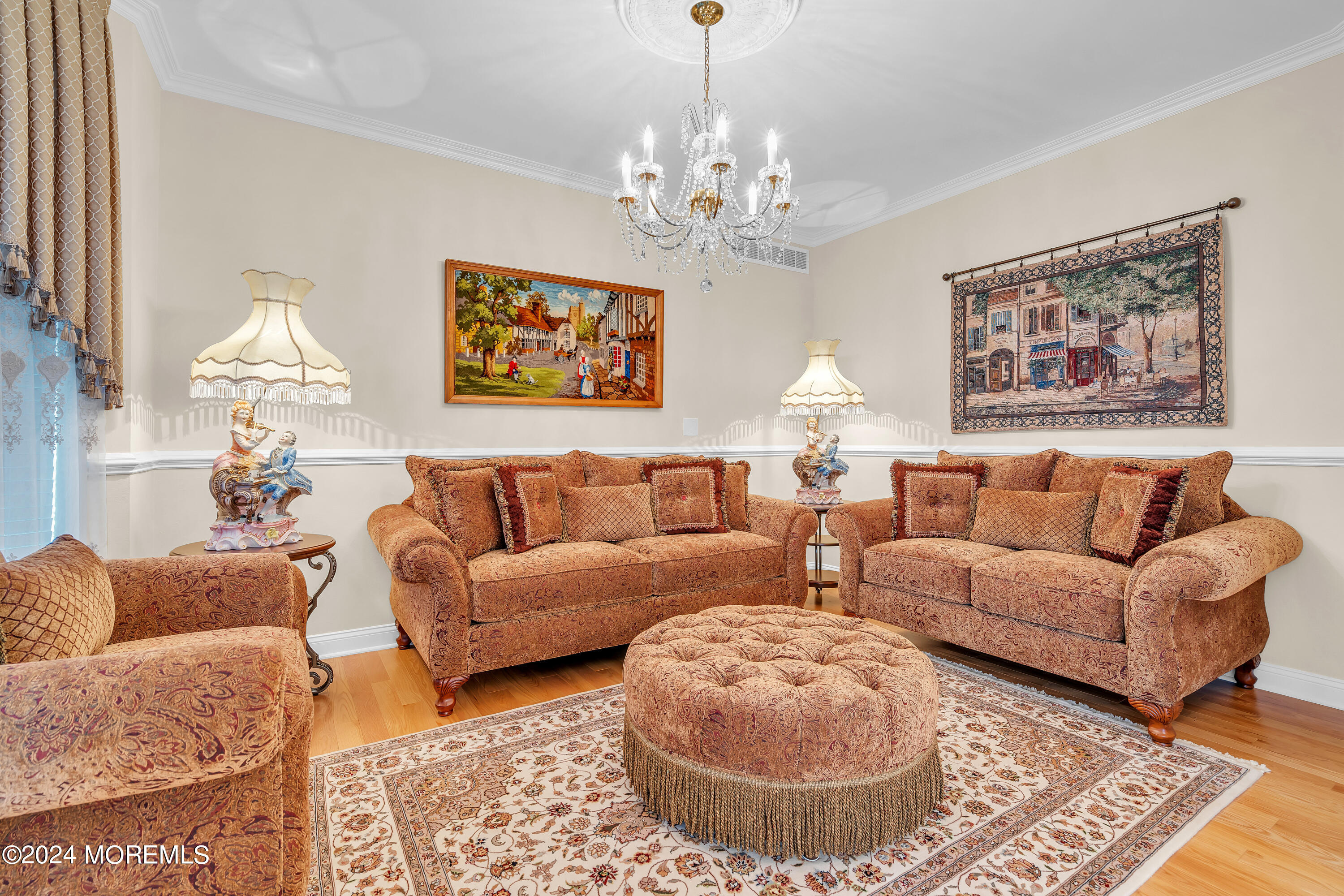 2050 MacKenzie Road Toms River, NJ 08755 - Photo 12 of 95 a living room with furniture a chandelier and a rug