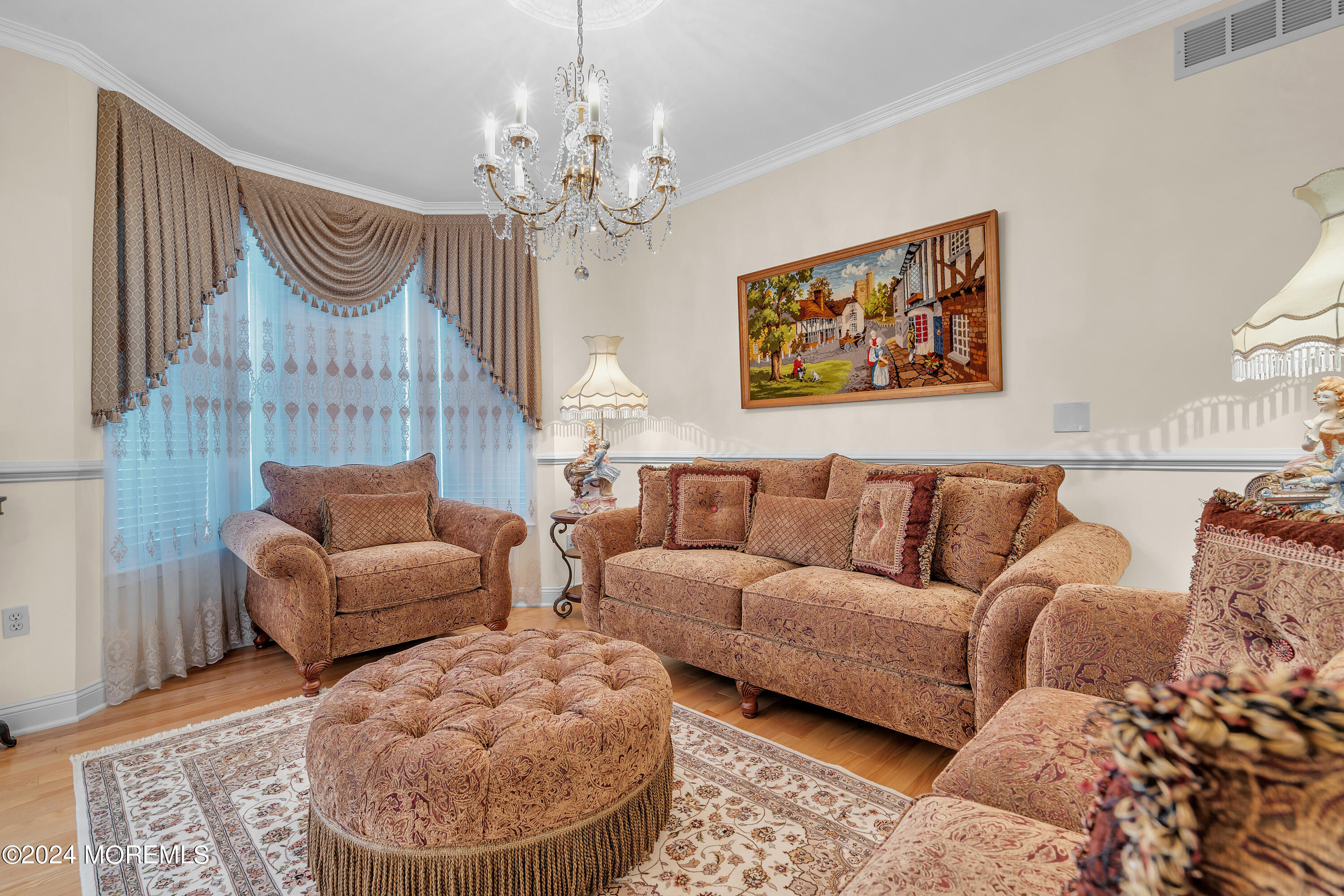 2050 MacKenzie Road Toms River, NJ 08755 - Photo 13 of 95 a living room with furniture and a chandelier