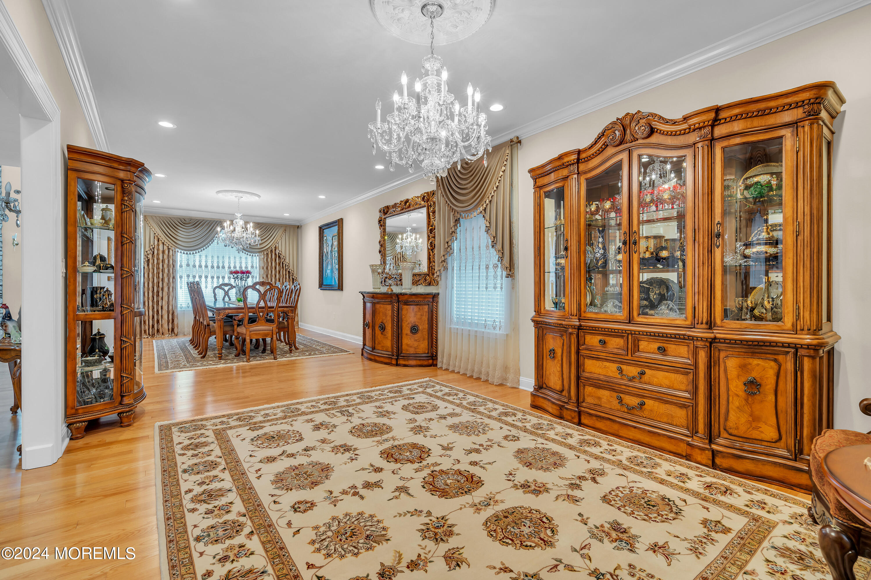 2050 MacKenzie Road Toms River, NJ 08755 - Photo 16 of 95 a living room with furniture and a chandelier