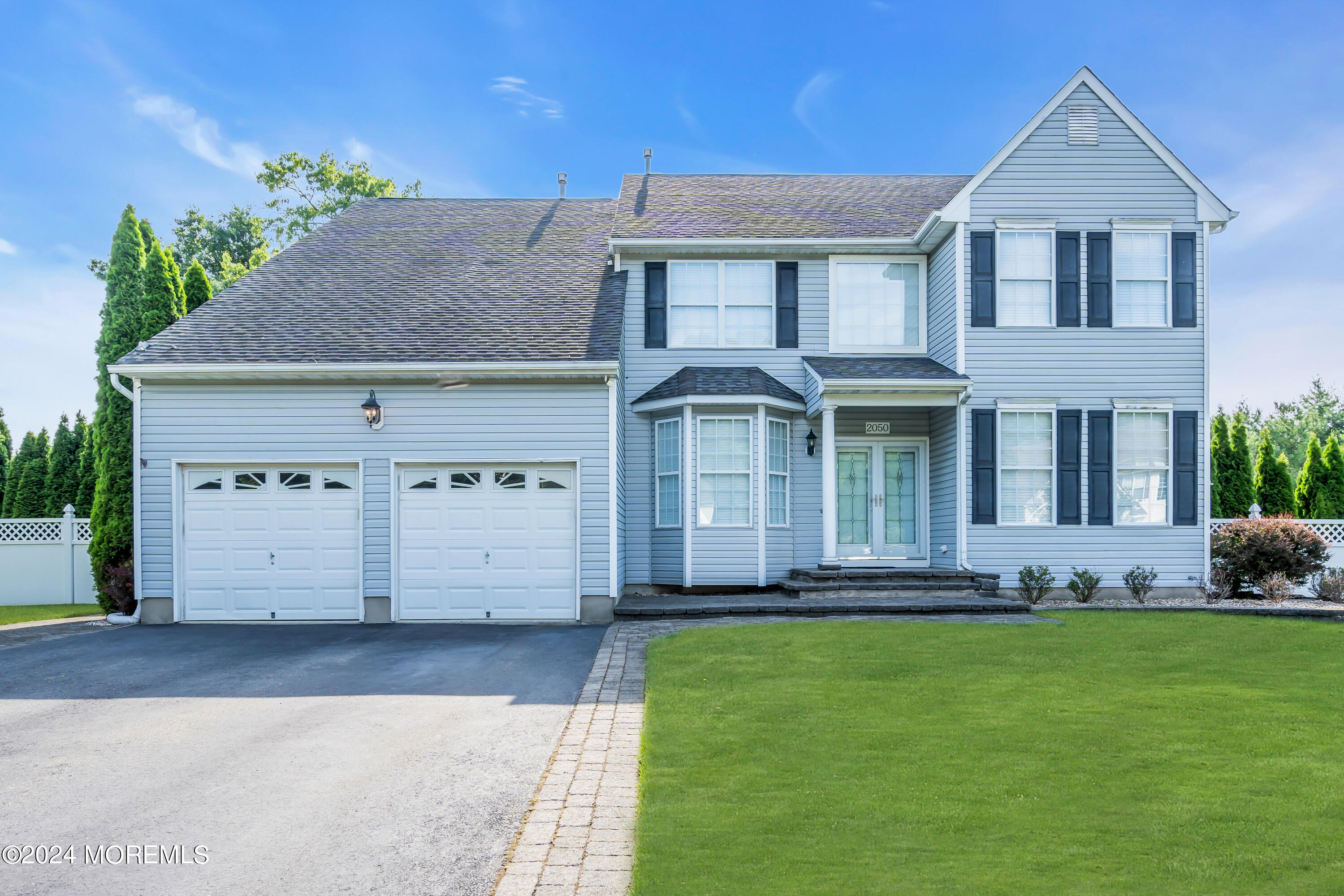 2050 MacKenzie Road Toms River, NJ 08755 - Photo 2 of 95 a front view of a house with a yard