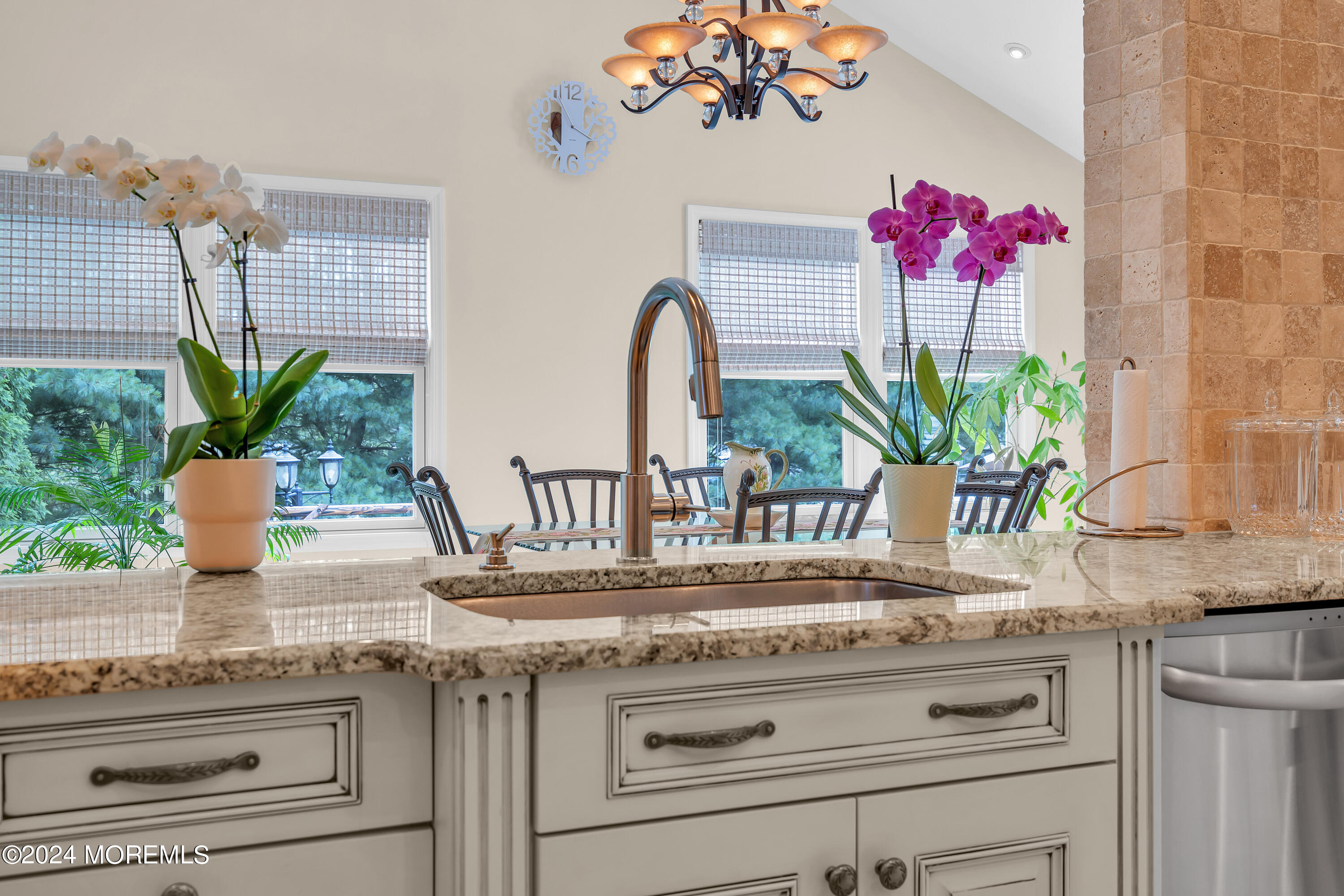 2050 MacKenzie Road Toms River, NJ 08755 - Photo 34 of 95 a kitchen with a granite countertop sink a potted plant and a wooden floor